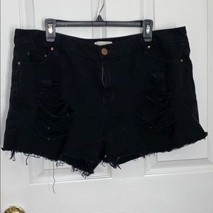 Ripped black shorts